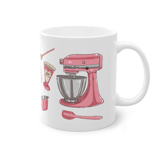 a coffee mug with a pink kitchen mixer on it