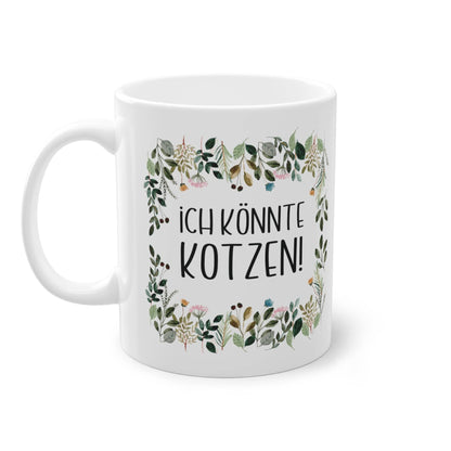 a white coffee mug with a floral border