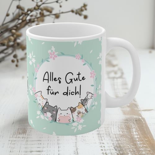 Niedliche Geschenk-Tasse in Mintgrün mit Blumendesign und Katzenillustrationen, Aufschrift „Alles Gute für dich!“ – ideal für Geburtstage, kleine Gesten und herzliche Wünsche.