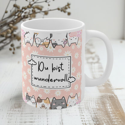 Liebevoll gestaltete rosa Tasse mit Blumenmuster, süßen Katzen und der Aufschrift „Du bist wundervoll“ – perfektes Geschenk für Freundinnen, Kolleginnen oder zum Selbstverwöhnen.