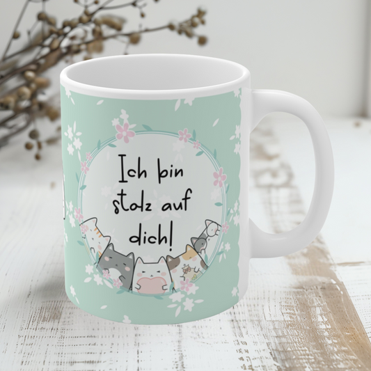 Keramiktasse mit mintgrünem Hintergrund, süßem Katzenmotiv und der Botschaft „Ich bin stolz auf dich!“ – liebevolles Geschenk für Motivation, Prüfungen oder zur Aufmunterung.