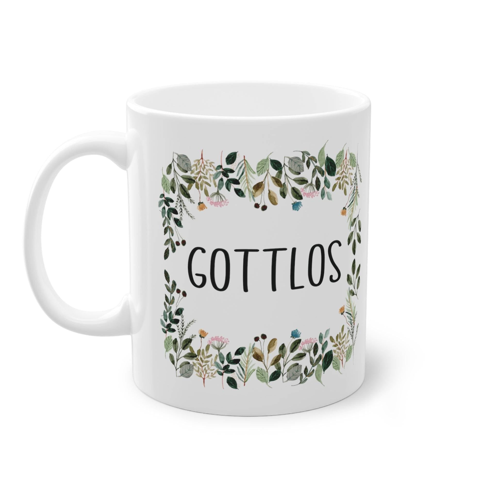 a white coffee mug with the words gottllos printed on it