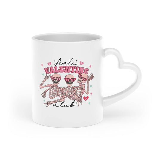 Trete dem 'Anti-Valentine's Club' bei und zeige deine rebellische Seite mit unserer Anti Valentinstag Tasse mit Herzgriff. Mit witzigen Print und Spruch.