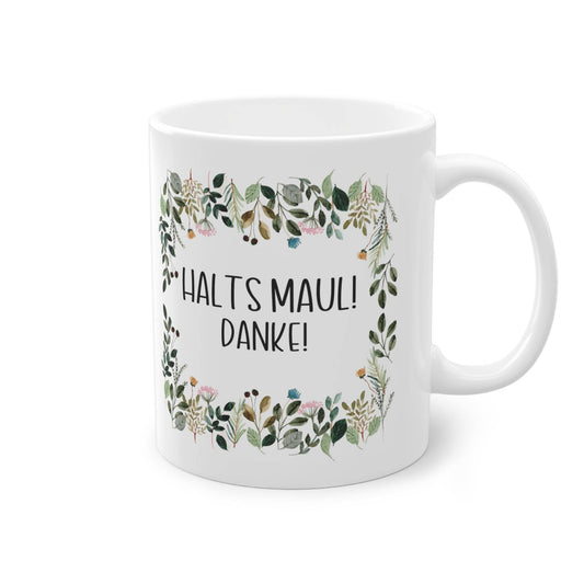 a white coffee mug with the words, what's mauli danke?