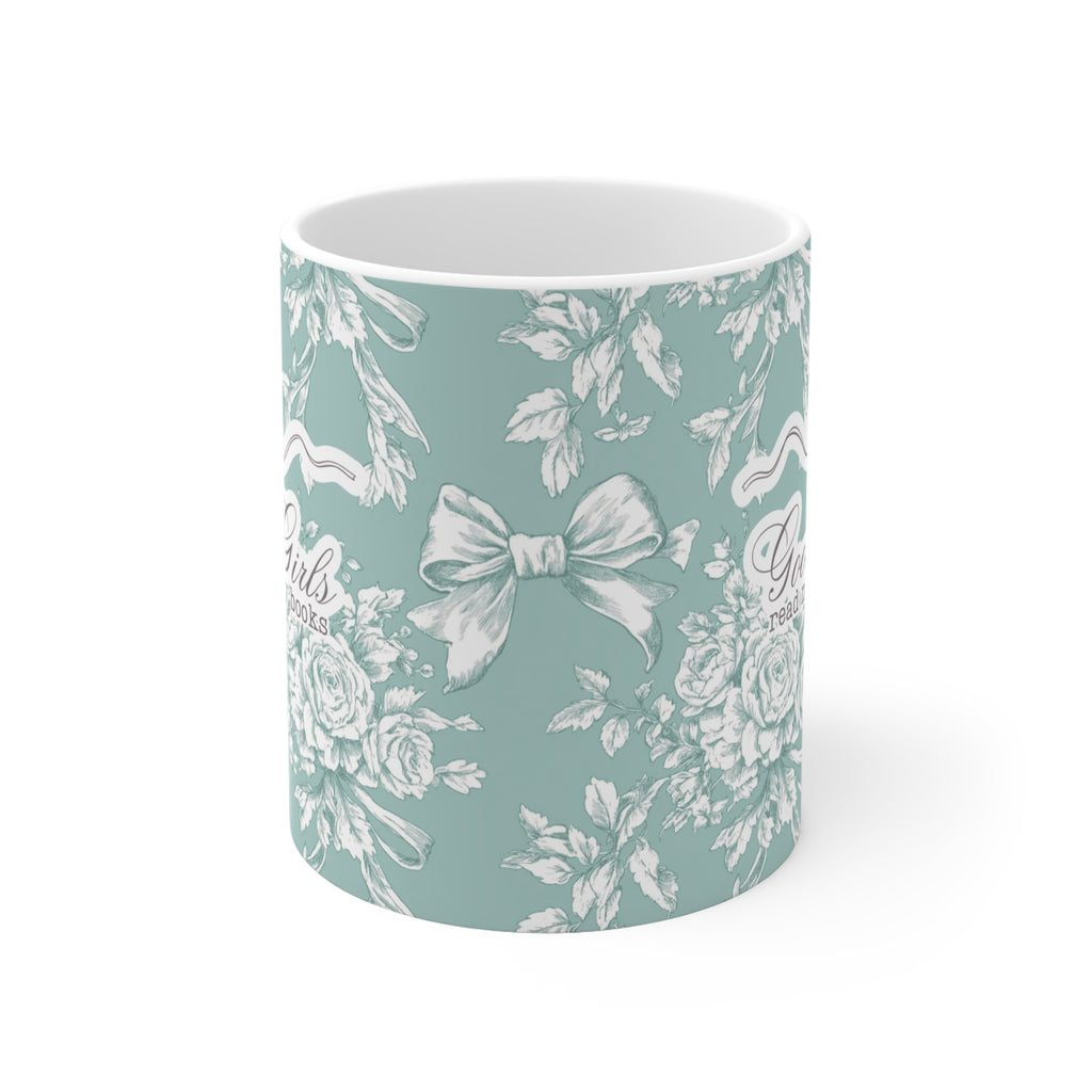 Mintfarbene Tasse mit romantischem Blumenmuster und dem frechen Spruch „Good Girls read naughty books“ – humorvolle Geschenkidee für Leserinnen von spicy Büchern und Fantasy Romance.