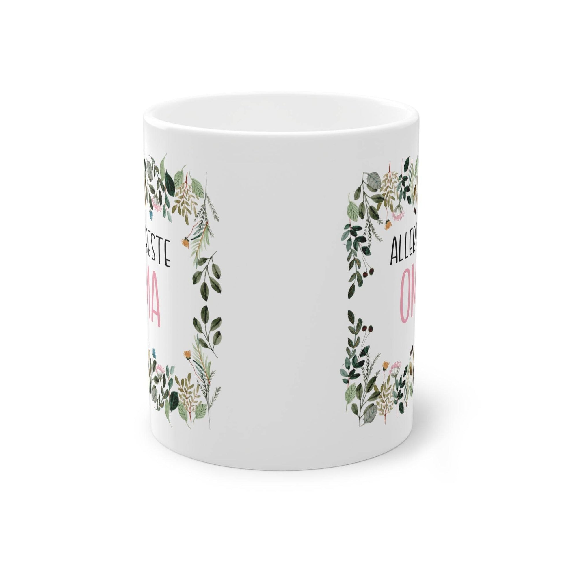 a white mug with a floral design on it
