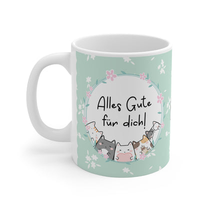 Niedliche Geschenk-Tasse in Mintgrün mit Blumendesign und Katzenillustrationen, Aufschrift „Alles Gute für dich!“ – ideal für Geburtstage, kleine Gesten und herzliche Wünsche.