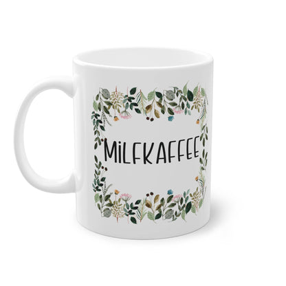 a coffee mug with the words milk kaffee printed on it