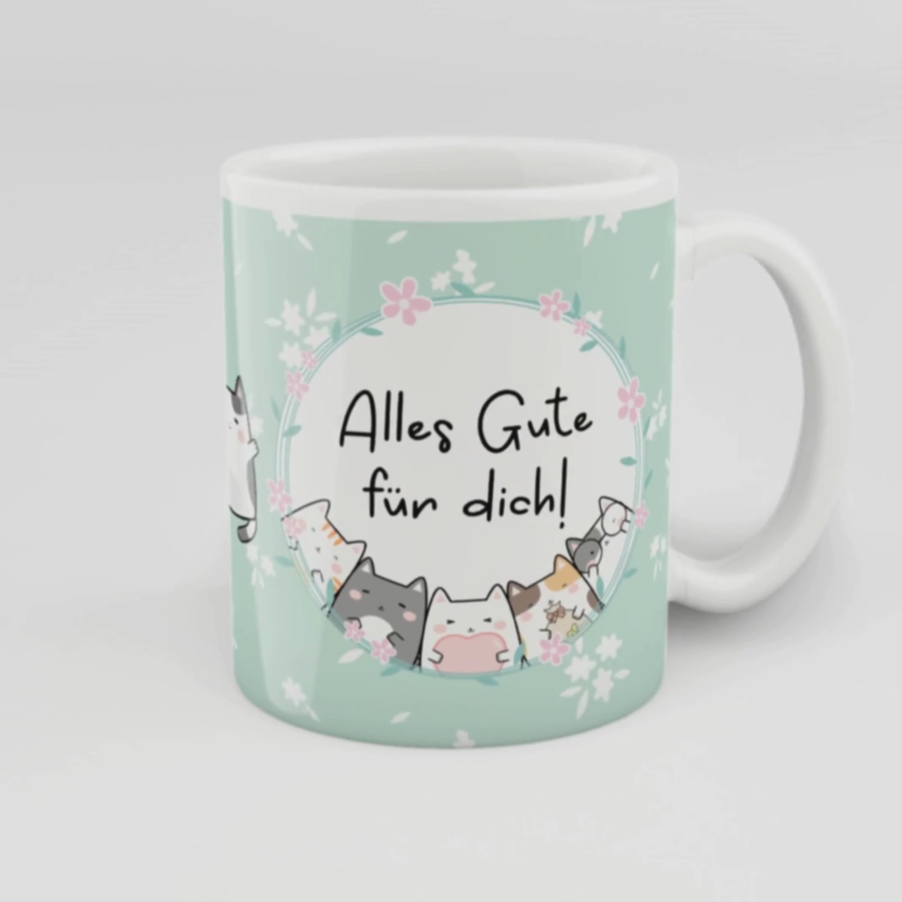 Niedliche Geschenk-Tasse in Mintgrün mit Blumendesign und Katzenillustrationen, Aufschrift „Alles Gute für dich!“ – ideal für Geburtstage, kleine Gesten und herzliche Wünsche.