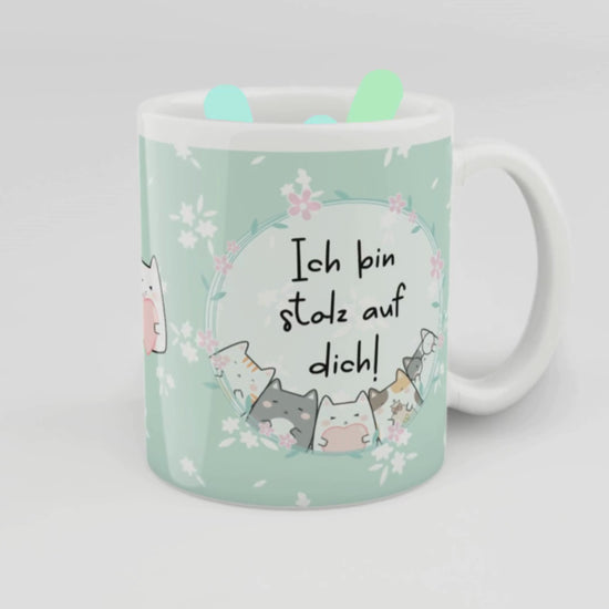 Keramiktasse mit mintgrünem Hintergrund, süßem Katzenmotiv und der Botschaft „Ich bin stolz auf dich!“ – liebevolles Geschenk für Motivation, Prüfungen oder zur Aufmunterung.