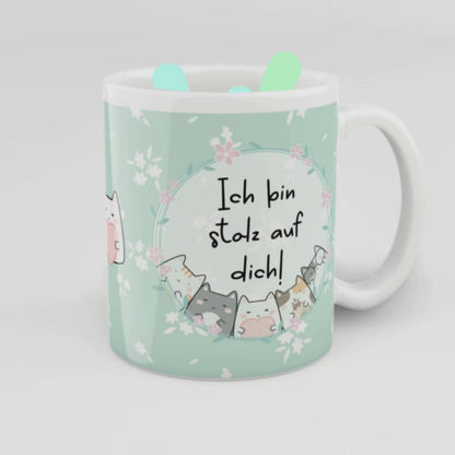 Keramiktasse mit mintgrünem Hintergrund, süßem Katzenmotiv und der Botschaft „Ich bin stolz auf dich!“ – liebevolles Geschenk für Motivation, Prüfungen oder zur Aufmunterung.