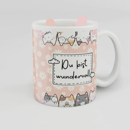 Liebevoll gestaltete rosa Tasse mit Blumenmuster, süßen Katzen und der Aufschrift „Du bist wundervoll“ – perfektes Geschenk für Freundinnen, Kolleginnen oder zum Selbstverwöhnen.